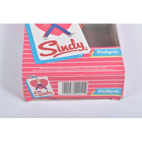 45 - A BOXED PEDIGREE SINDY STARLIGHT DOLL, numbered 42011, shiny pink outfit dolls shoes free within the... 