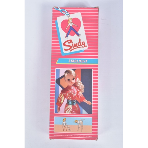 45 - A BOXED PEDIGREE SINDY STARLIGHT DOLL, numbered 42011, shiny pink outfit dolls shoes free within the... 