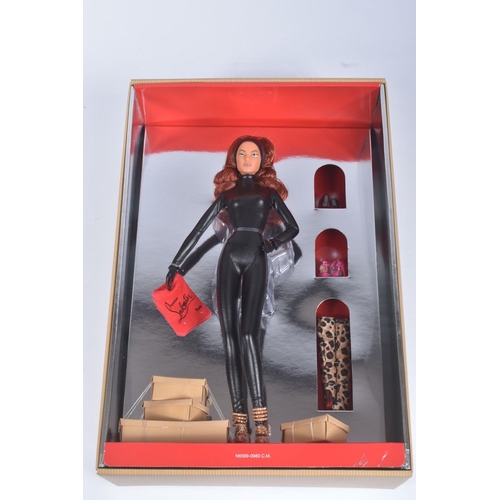 64 - A BOXED MATTEL BARBIE COLLECTOR BARBIE BY CHRISTIAN LOUBOUTIN DOLL, No.N6599, appears complete and i... 