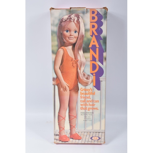 119 - TWO BOXED 1971 IDEAL DOLLS, the first a Brandi, reference 1068-6, blonde haired doll with orange swi... 