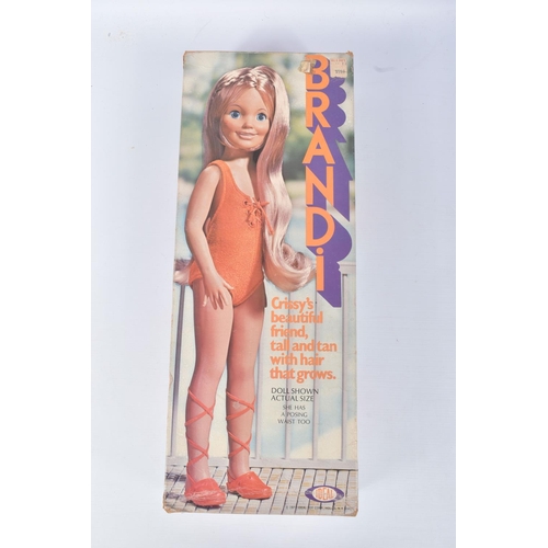 119 - TWO BOXED 1971 IDEAL DOLLS, the first a Brandi, reference 1068-6, blonde haired doll with orange swi... 