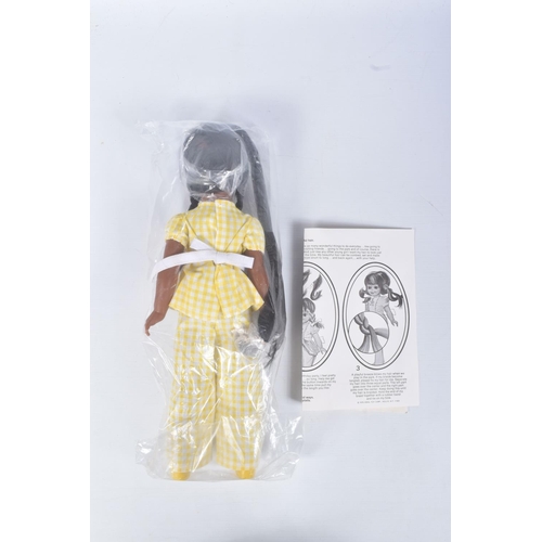 121 - A BOXED 1976 IDEAL TARA DOLL, reference 1239-3, doll wearing yellow chequered yellow outfit featurin... 