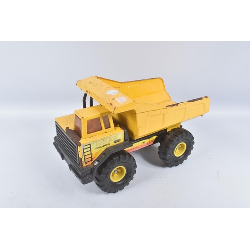 126 - FOUR MIGHTY TONKA TOYS DUMPER TRUCKS, all in playworn condition with paint loss, surface rusting, ma... 