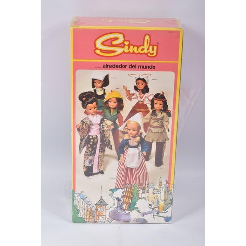 90 - A BOXED SINDY DOLL, in a Exinmex Mexico box, wearing a red jacket, chequered red and white scarf and... 