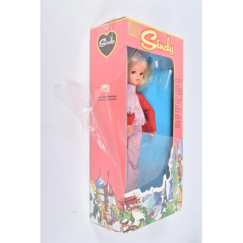 90 - A BOXED SINDY DOLL, in a Exinmex Mexico box, wearing a red jacket, chequered red and white scarf and... 