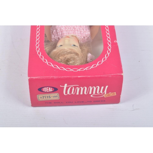 155 - A BOXED IDEAL TAMMY DOLL, blonde doll in pink gingham dress, No.7115-100, head appears paler than ot... 