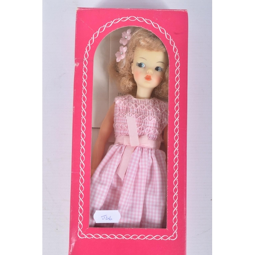 155 - A BOXED IDEAL TAMMY DOLL, blonde doll in pink gingham dress, No.7115-100, head appears paler than ot... 