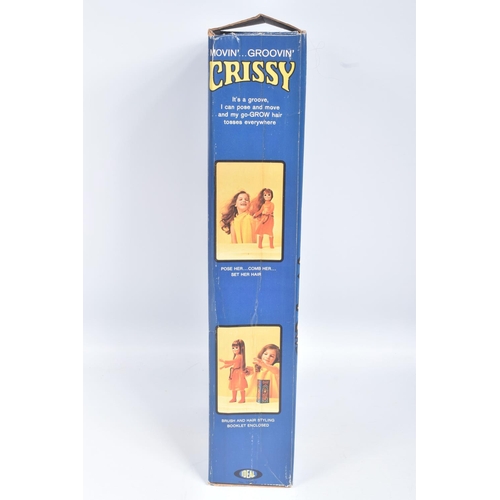 165 - TWO BOXED IDEAL CRISSY DOLLS, the first a 1969 Beautiful Crissy, reference 1051-2, doll wearing a fl... 