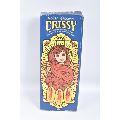 165 - TWO BOXED IDEAL CRISSY DOLLS, the first a 1969 Beautiful Crissy, reference 1051-2, doll wearing a fl... 