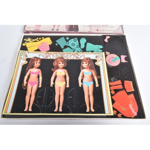 168 - A BOXED IDEAL TOYS CRISSY DRESS-UP SET, numbered 2301, contains still atatched carboard sheets of fi... 