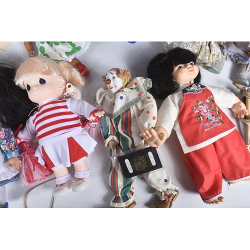 176 - A QUANTITY OF ASSORTED DOLLS, to include Precious Moments 'Cheerleader', No.1417, with swing tag and... 