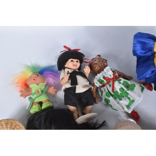 176 - A QUANTITY OF ASSORTED DOLLS, to include Precious Moments 'Cheerleader', No.1417, with swing tag and... 