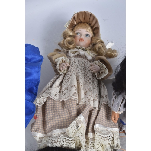 176 - A QUANTITY OF ASSORTED DOLLS, to include Precious Moments 'Cheerleader', No.1417, with swing tag and... 