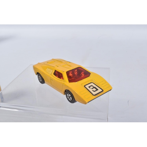 189 - FOUR BOXED MATCHBOX SUPERFAST MODEL CARS, the first a 27 e New Lamborghini Countach, yellow body, re... 