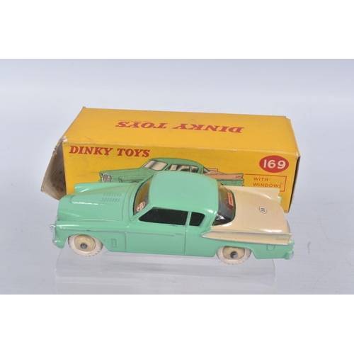 196 - TWO BOXED DIE CAST DINKY TOYS MODEL VEHICLES, the first a type 2 Studebaker Golden Hawk, reference 1... 