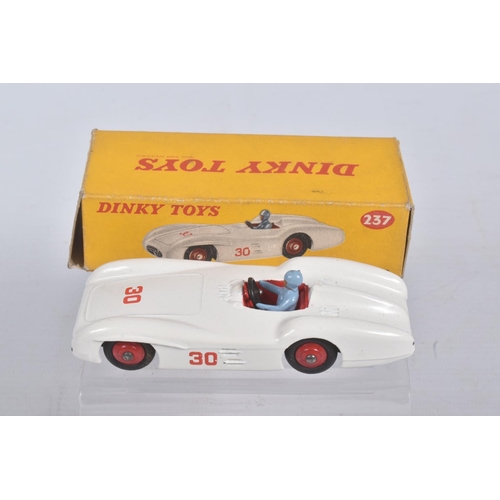 201 - FOUR BOXED DIECAST DINKY TOYS MODEL SPORTS CARS, the first a Mercedes Benz Racing Car, reference 237... 