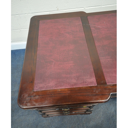 152 - A REPRODUCTION GEORGIAN STYLE MAHOGANY PARTNERS DESK, with three plumb leatherette writing surfaces,... 