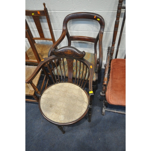 187 - AN OAK AMERICAN STYLE ROCKING CHAIR, two armchairs, a pair of rush seated chairs, two chairs with ci... 