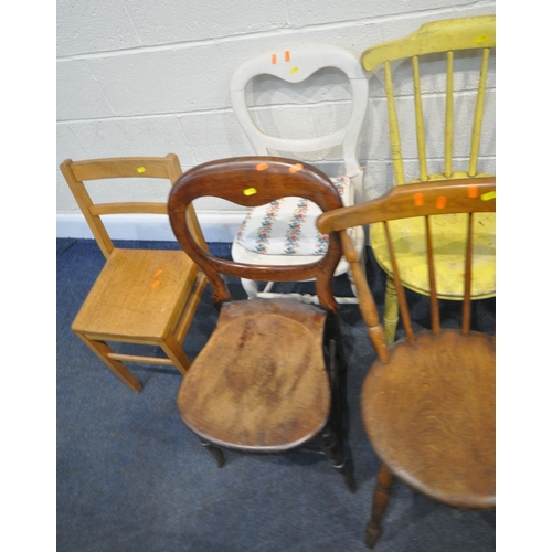 187 - AN OAK AMERICAN STYLE ROCKING CHAIR, two armchairs, a pair of rush seated chairs, two chairs with ci... 