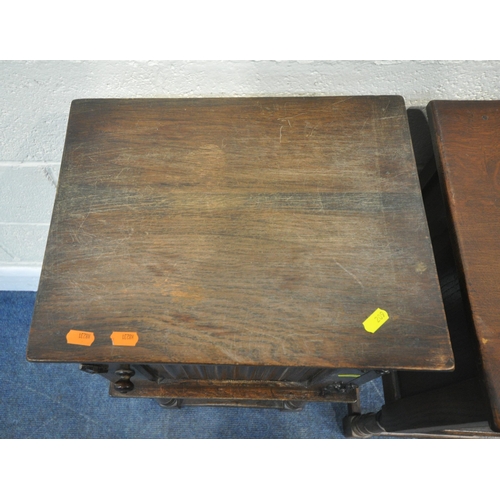 209 - A 20TH CENTURY OAK SIDE TABLE, with a single cupboard door, geometric carvings, raised on turned fro... 