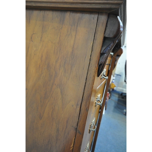 223 - A 19TH CENTURY MAHOGANY WELLINGTON CHEST, fitted with eight graduated drawers, and a hinged locking ... 