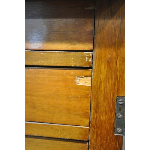 223 - A 19TH CENTURY MAHOGANY WELLINGTON CHEST, fitted with eight graduated drawers, and a hinged locking ... 