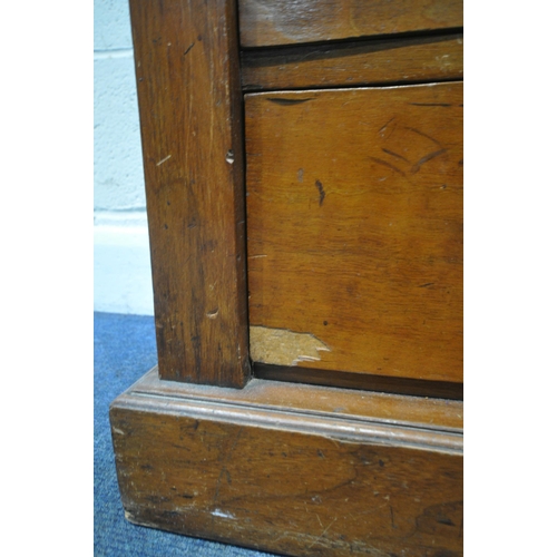 223 - A 19TH CENTURY MAHOGANY WELLINGTON CHEST, fitted with eight graduated drawers, and a hinged locking ... 