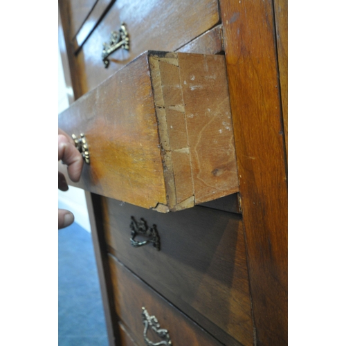 223 - A 19TH CENTURY MAHOGANY WELLINGTON CHEST, fitted with eight graduated drawers, and a hinged locking ... 