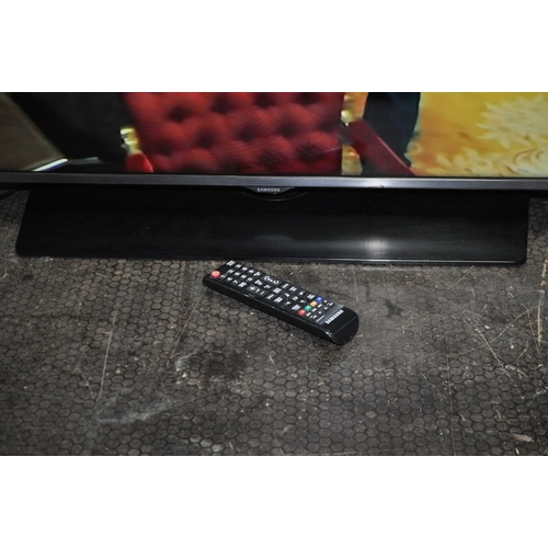 52 - A SAMSUNG UE50H5000 50in TV WITH REMOTE (PAT pass and working)