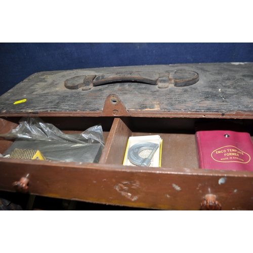 56 - A VINTAGE CARPENTERS TOOLBOX, containing a small amount of tools, a military wooden chest and a work... 