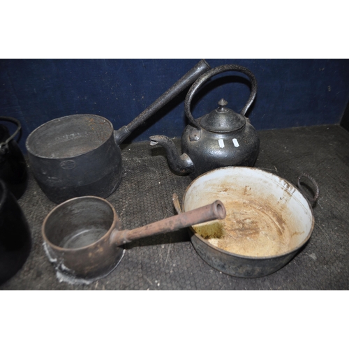 66 - A COLLECTION OF EARLY TO MID 20th CENTURY METAL COOKWARE, including two enamel saucepans and a pot (... 