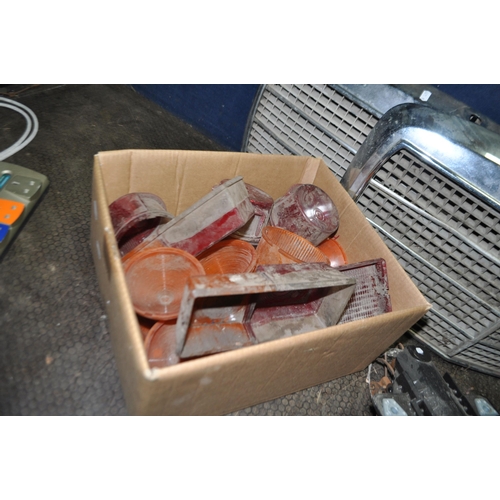 68 - TWO TRAYS CONTAINING VINTAGE AND MODERN CAR PARTS, including two late 20th Century Mercedes front gr... 