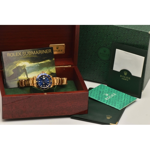 403 - AN 18CT ROLEX OYSTER PERPETUAL SUBMARINER WRISTWATCH, reference 16618, blue dial with white enamelle... 