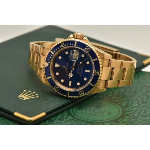 403 - AN 18CT ROLEX OYSTER PERPETUAL SUBMARINER WRISTWATCH, reference 16618, blue dial with white enamelle... 