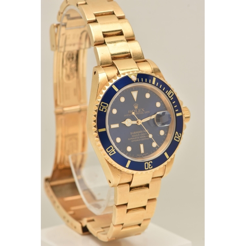 403 - AN 18CT ROLEX OYSTER PERPETUAL SUBMARINER WRISTWATCH, reference 16618, blue dial with white enamelle... 