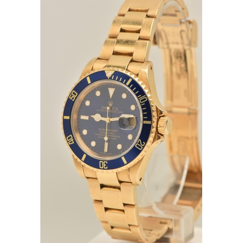 403 - AN 18CT ROLEX OYSTER PERPETUAL SUBMARINER WRISTWATCH, reference 16618, blue dial with white enamelle... 