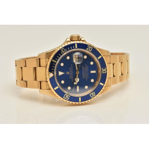 403 - AN 18CT ROLEX OYSTER PERPETUAL SUBMARINER WRISTWATCH, reference 16618, blue dial with white enamelle... 