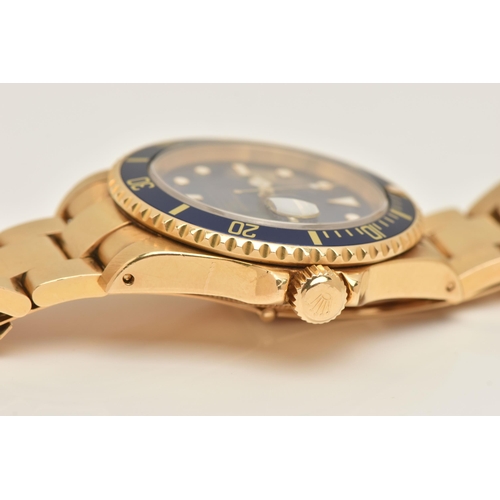 403 - AN 18CT ROLEX OYSTER PERPETUAL SUBMARINER WRISTWATCH, reference 16618, blue dial with white enamelle... 