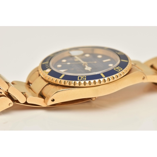 403 - AN 18CT ROLEX OYSTER PERPETUAL SUBMARINER WRISTWATCH, reference 16618, blue dial with white enamelle... 