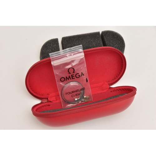 411 - AN OMEGA CASE AND A SMALL QUANTITY OF PARTS, a red 'Omega' travel case with inserts, together with a... 