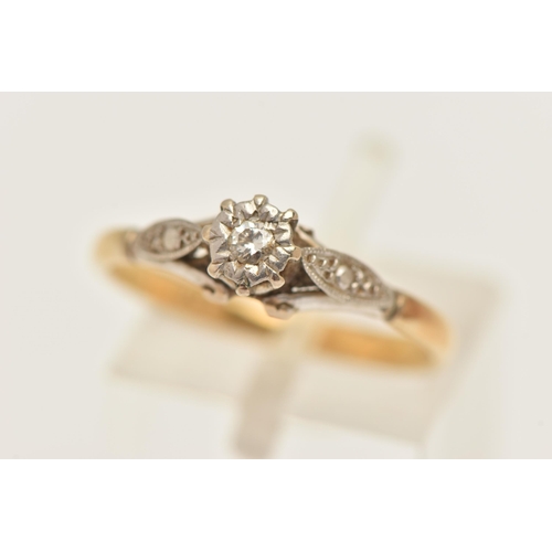 428 - A DIAMOND SINGLE STONE RING, set with a round brilliant cut diamond, to the raised white metal shoul... 