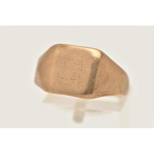 431 - A GENTS 9CT GOLD SIGNET RING, of a square form, very worn engraving, to a polished band, hallmarked ... 