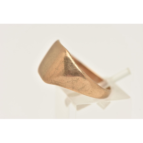 431 - A GENTS 9CT GOLD SIGNET RING, of a square form, very worn engraving, to a polished band, hallmarked ... 