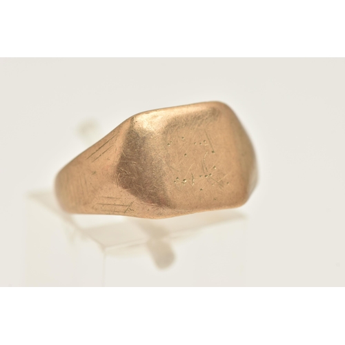 431 - A GENTS 9CT GOLD SIGNET RING, of a square form, very worn engraving, to a polished band, hallmarked ... 