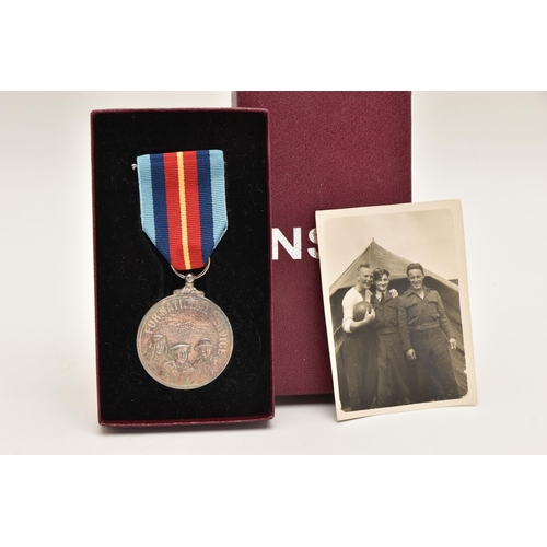 513 - A SILVER 'FOR NATIONAL SERVICES' MEDAL, inscribed 'In Recognition of Valuable Service To Your Countr... 