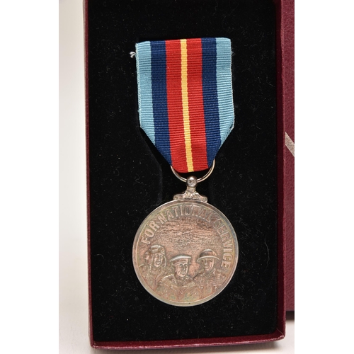 513 - A SILVER 'FOR NATIONAL SERVICES' MEDAL, inscribed 'In Recognition of Valuable Service To Your Countr... 