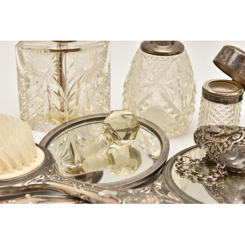 519 - ASSORTED VANITY ITEMS, to include a three piece embossed cherub and swag pattern hand held mirror, h... 