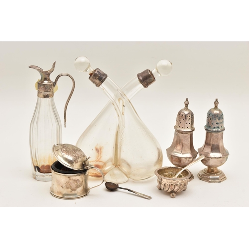 520 - A SELECTON OF SILVERWARE, to include a mid-Victorian glass oil and vinegar bottle with silver collar... 