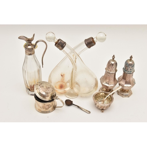 520 - A SELECTON OF SILVERWARE, to include a mid-Victorian glass oil and vinegar bottle with silver collar... 