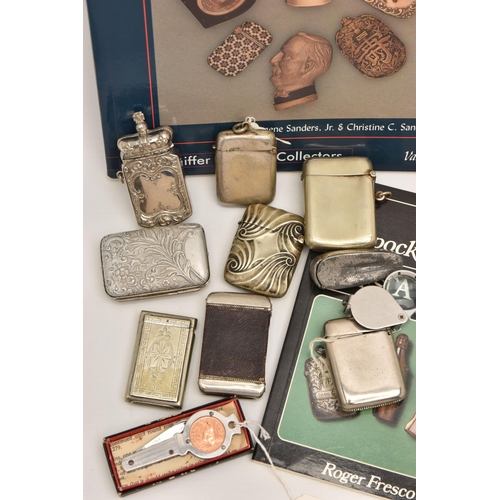 523 - A BOX OF ASSORTED WHITE METAL VESTA CASES AND TWO BOOKS, nine vesta in total of various designs, a b... 